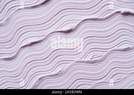 Gently purple texture and strokes of a facial cleansing mask or acrylic paint isolated on a white background Stock Photo