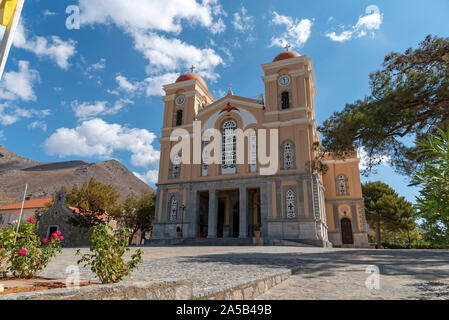 Neopolis, northern Crete, Greece.   On the Old National Road as driving into Neopolis a Cretan historic town is the Church of the Virgin Mary Stock Photo