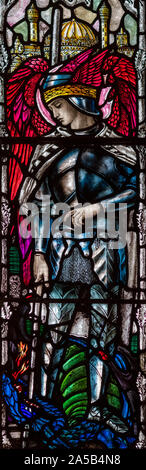Christopher Whalls (1923) depiction of St. Michael overcoming the dragon, St. Leonards Church, Middleton, Greater Manchester, UK Stock Photo