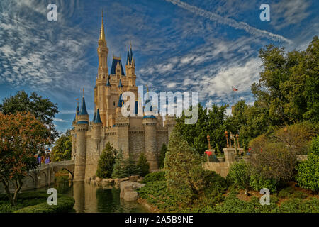 Cinderella's castle in Magic kingdom, Disney world, Orlando , Florida Daylight view with clouds in the sky in background Stock Photo