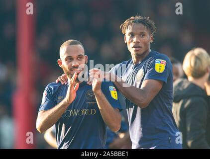 London, UK. 19th Oct, 2019. Brentford Bryan Mbeumo and Brentford's Julian Jeanvier celebrating after the Sky Bet Championship match between Brentford and Millwall at Griffin Park, London, England on 19 October 2019. Photo by Andrew Aleksiejczuk/PRiME Media Images. Credit: PRiME Media Images/Alamy Live News Stock Photo