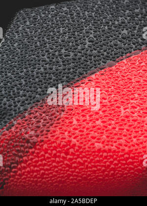 Wet beautiful car Headlamp, black car with water drop. Close up Side view shot from side of vehicle. Detailing concept. Stock Photo