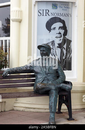 Bronze statue of Sir Norman Wisdom in Douglas, Isle of Man Stock Photo ...