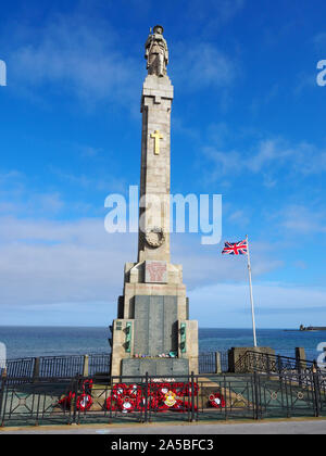Douglas War memorial monument column on the seafront. Seafront Promenade, Douglas, Isle of Man, UK Stock Photo