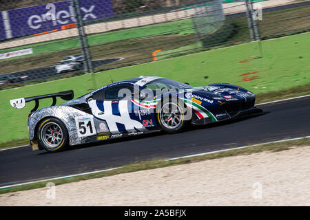 Vallelunga, Italy september 15 2019. Full length of racing Ferrari 388 evo in action during race blurred motion background Stock Photo