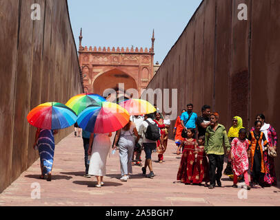 Tourists and a local Indian family visiting at the Red Fort in Agra, India. Stock Photo