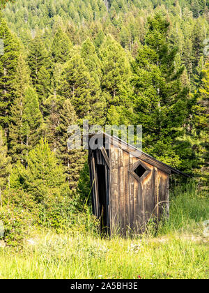 Abandoned log buildings in western ghost town. Stock Photo