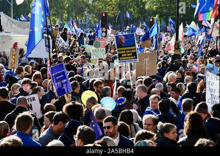 Large Crowd with Placards. People's Vote March. Close to one million Anti-Brexit protesters marched on Parliament to demand a second referendum.Palace of Westminster, Parliament Square, London. UK Stock Photo