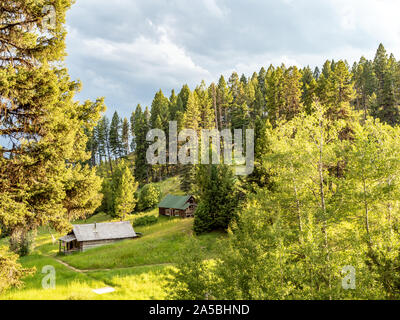 Abandoned log buildings in western ghost town. Stock Photo