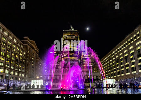 Colourful lights and water fountain at Cabot Square. Annual Winter lights festival in Canary Wharf London England Stock Photo