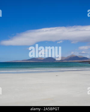 Luskentyre beach, Isle of Harris with Taransay and hills in the background, scotland UK, 2018 lenticular cloud and white sand Stock Photo