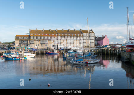 Landscape photo of Pier Terrace at West Bay in Dorset. Stock Photo