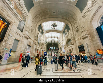 September 27, 2019. Arrival hall Milano Centrale railway stration of Milan, Italy. Milano Centrale Railway Station. Traveling people inside the Stock Photo