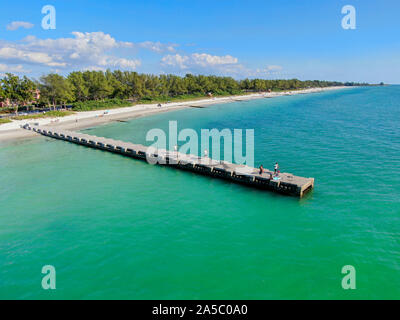 Aerial view of Cortez beach withe sand beach and his little wood pier on blue water, Anna Maria Island, Florida, USA Stock Photo