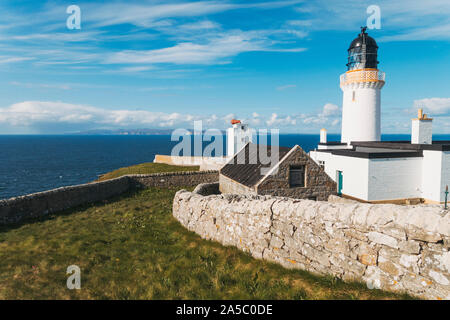 The Dunnet Head Lighthouse on a clear sunny afternoon, at the most northerly point on the UK mainland Stock Photo