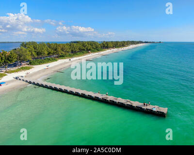 Aerial view of Cortez beach withe sand beach and his little wood pier on blue water, Anna Maria Island, Florida, USA Stock Photo