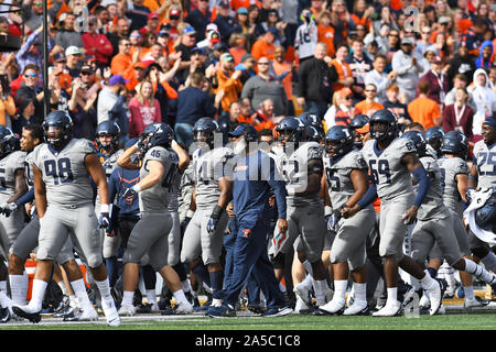 Champaign, Illinois, USA. 19th Oct, 2019. Coach Love Smith walking the sideline as players celebrate a big play during the NCAA Big Ten conference football game between the Illinois vs Wisconsin at Memorial Stadium in Champaign, Illinois. Dean Reid/CSM/Alamy Live News Stock Photo