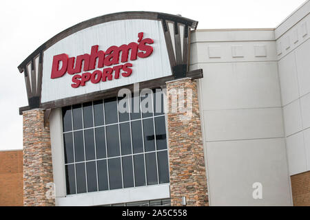 A logo sign outside of a Dunham's Sports retail store in Danville, Virginia on September 15, 2019. Stock Photo