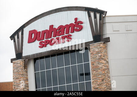 A logo sign outside of a Dunham's Sports retail store in Danville, Virginia on September 15, 2019. Stock Photo