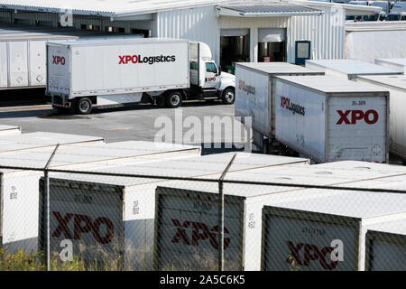 XPO Logistics semi-trailer trucks and trailers at a freight facility in Roanoke, Virginia on September 15, 2019. Stock Photo