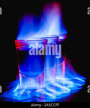 burning drink in shot glass Stock Photo