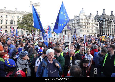 Supporters of the people's vote converged on Westminster after marching through central London calling for a final say on a new deal .As MPs delivered a blow to the PM new deal loud cheers could be heard in Parliament Square from the demonstrators. Up to a million people attended the march.MP's were heckled by protesters as they left Westminster .Protesters travelled from all over the UK to attend the protest . Shadow chancellor John Mc Donnell and Liberal Democrat leader Jo Swinson were among the politicians to address the rally alongside celebrities ... Stock Photo