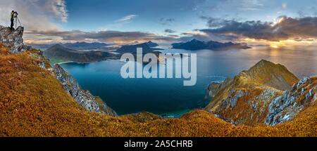 Panoramic shot of the hill Veggen near the sea under a blue sky in Norway Stock Photo
