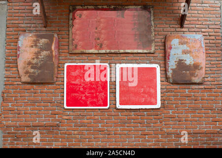 The brick wall with steel plate red. Stock Photo