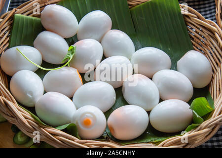 Boiled eggs peeled on the banana leaves. Stock Photo