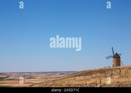 Windmill near the town of Belmonte in the La Mancha region of central Spain - Space for Text. Stock Photo