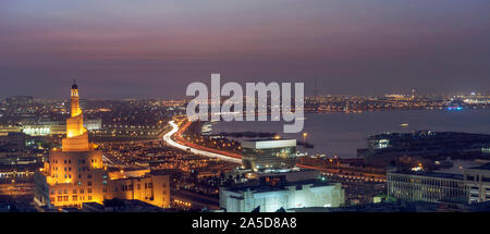 Ariel View of Doha City with Iconic Doha Fanar Mosque sunset time Stock Photo