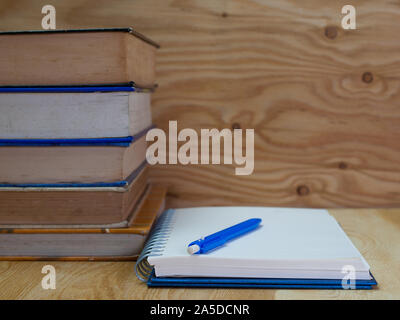 old books , and notebooks  Placed on a wooden floor.  (View with copy space) Stock Photo
