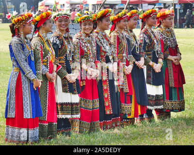 KAOHSIUNG, TAIWAN -- SEPTEMBER 28, 2019: Women of the indigenous Rukai tribe perform a dance during the traditional harvest festival. Stock Photo