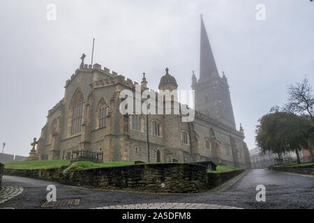 Derry, UK - Oct 13, 2019: St Columb's Cathedral on a foggy morning. Stock Photo