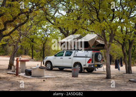 Tent located on the roof of a pickup 4x4 car in a camp in Etosha National Park Stock Photo