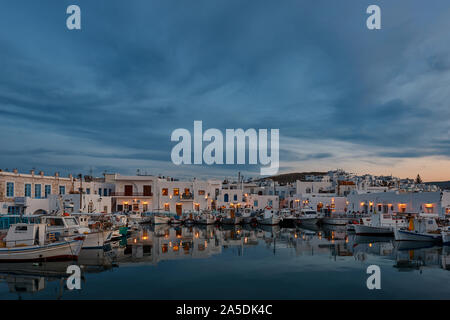 NAOUSSA, PAROS, GREECE - 23 May , 2015: The Venetian harbor of Naoussa on Paros Island, Cyclades. Fish taverns and boats everywhere Stock Photo