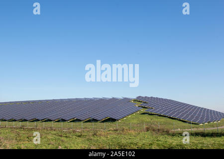 A solar farm producing green energy in The Netherlands Stock Photo
