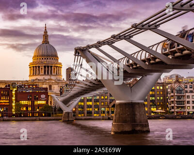 St Paul's Cathedral and Millennium Bridge  over River Thames, London, UK.