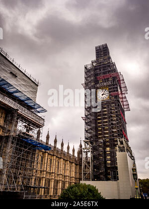 The Elizabeth Tower, known as Big Ben, almost entirely covered in scaffolding due to refurbishment work, Westminster, London, UK. Stock Photo