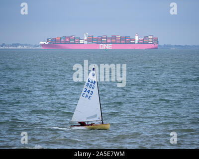 Sheerness, Kent, UK. 20th October, 2019. UK Weather: a cold afternoon in Sheerness, Kent. Pictured: the distinctive 365m long purple hulled container ship 'ONE Minato'. The ONE shipping company decided to paint all newly launched ships in eye-catching magenta, inspired by the cherry blossoms common in Japan, where its three parent companies are located. Credit: James Bell/Alamy Live News Stock Photo