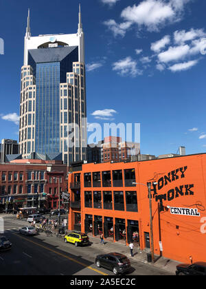 Nashville, TN, USA - September 22, 2019:  The intersection  at the historic Broadway Street and 4th Aven N Honky-Tonk Central and the AT&T building kn Stock Photo