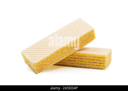 Two wafers with a lemon vanilla cream macro isolated on white. Clipping path Stock Photo