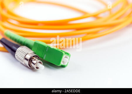 Fiber optic cable link plug connector on white background Stock Photo