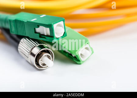 Fiber optic cable link plug connector on white background Stock Photo