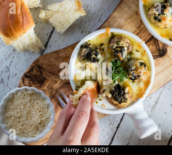 Escargot stuffed mushrooms. Stock Photo