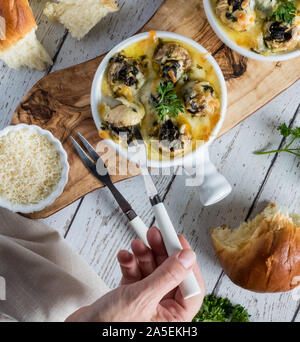 Escargot stuffed mushrooms. Stock Photo