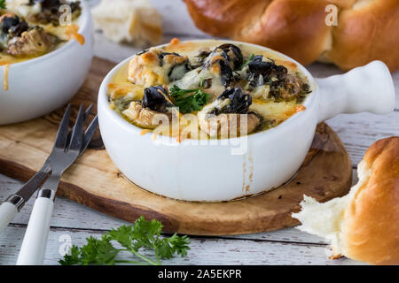 Escargot stuffed mushrooms. Stock Photo