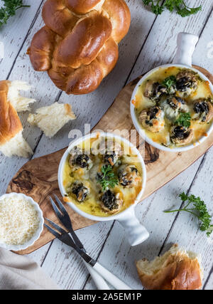 Escargot stuffed mushrooms. Stock Photo