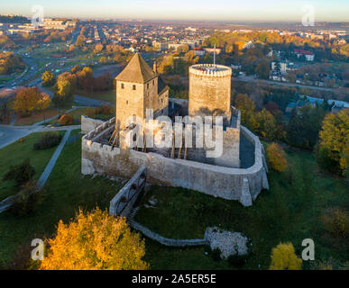 Medieval gothic castle in Bedzin, Upper Silesia, Poland. Aerial view in fall in sunrise light Stock Photo