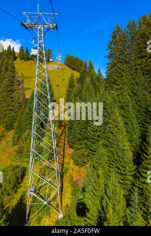 Grindelwald, Switzerland cable car First and autumn Swiss Alps mountains panorama landscape, green fields, Bernese Oberland, Europe Stock Photo